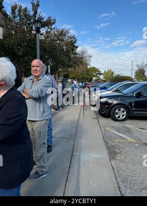 Record-setting people lined up waiting for hours for early voting in a presidential election, first day, October 21, 2024 in Wichita, Kansas, USA Stock Photo