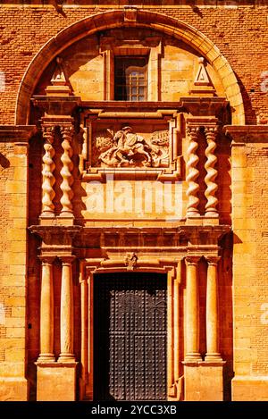 Relief depicting Santiago on a side facade. The Baroque Church of the Holy Christ of the Valley - Santísimo Cristo del Valle. San Carlos del Valle, Ci Stock Photo