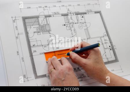 Hand drawn technical drawing. Architectural drawing exercise using drawing tools. Old technical floor plan made by student. Stock Photo