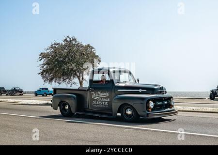 Gulfport, MS - October 04, 2023: Wide angle front corner view of a 1952 Ford F1 Stepside Pickup Truck at a local car show. Stock Photo
