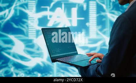System administrator solving tasks on laptop, running artificial intelligence programming scripts. Close up shot of technician manipulating lines of code for AI applications development, camera A Stock Photo