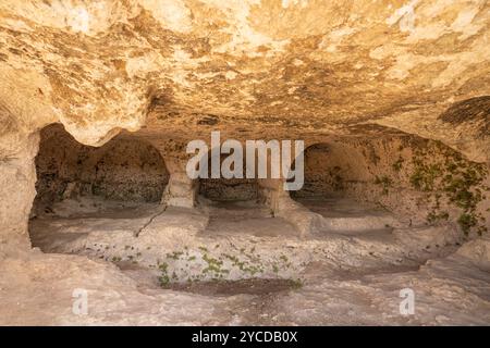 Catacombs built during the persecution of Christians of the Roman Empire of Syracuse, Neapolis Archaeological Park, Syracuse, Sicily, Italy Stock Photo