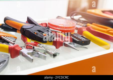 Different electrical tools on display in the store window. Industry Stock Photo