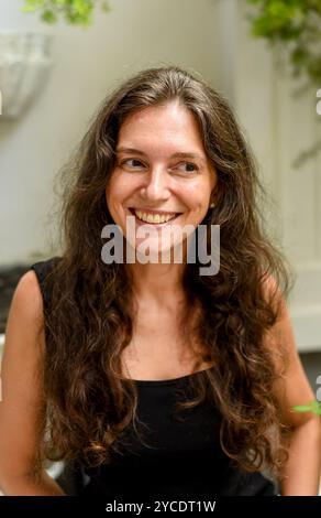 Portrait of 40 years old slavic woman close up without make up laughing and looking away Stock Photo
