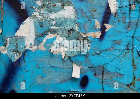 Grunge dirty blue wall with peeled paint texture background Stock Photo