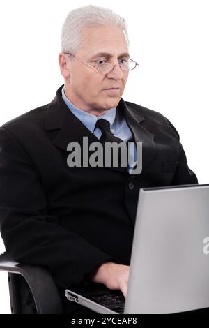 Mature business man busy working in notebook on white background Stock Photo