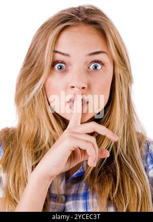 Women says ssshhh to maintain silence on a white background Stock Photo