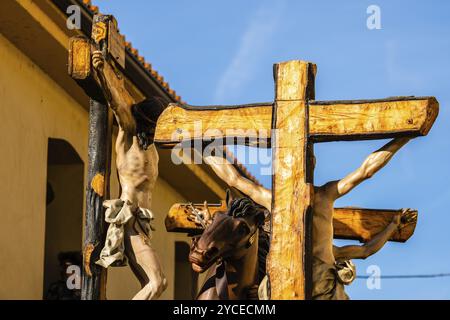 Zamora, Spain, April 7, 2023: Polychrome wood sculptural ensemble representing the crucifixion of Jesus accompanied by Mary, the thieves and the soldi Stock Photo