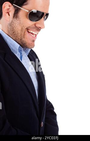 Side pose of a young model smiling Stock Photo - Alamy