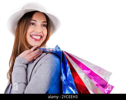 Portrait of young beautiful model carrying her shopping bags Stock Photo