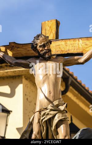 Zamora, Spain, April 7, 2023: Polychrome wood sculptural ensemble representing the crucifixion of Jesus accompanied by Mary, the thieves and the soldi Stock Photo