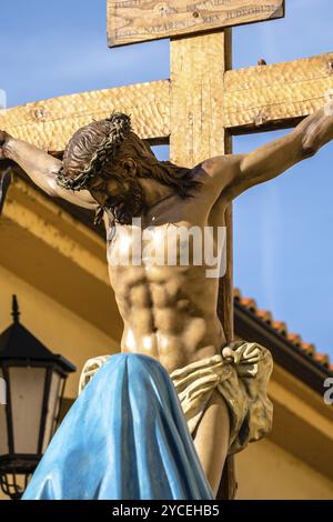 Zamora, Spain, April 7, 2023: Polychrome wood sculptural ensemble representing the crucifixion of Jesus accompanied by Mary, the thieves and the soldi Stock Photo