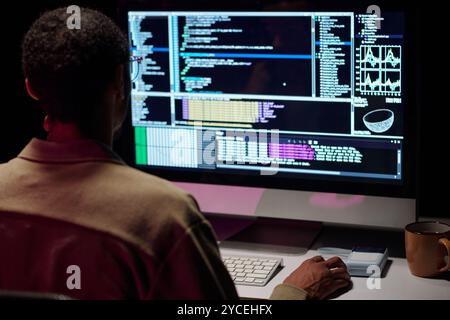 Coding Professional Working on Software Development Stock Photo