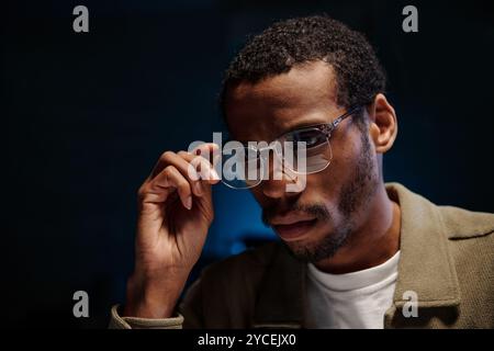 Portrait of African American Man Wearing Glasses Indoors Stock Photo