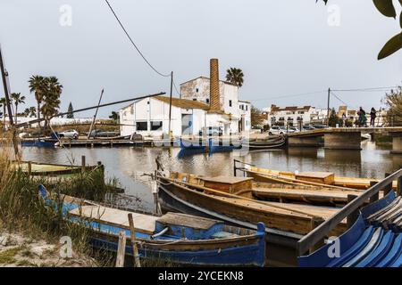 El Palmar, Spain, March 24, 2024: Traditional wooden boats in the village of El Palmar in Natural Park Albufera, Europe Stock Photo