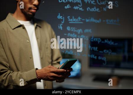 Collaborating on Coding Project in Modern Workspace Stock Photo