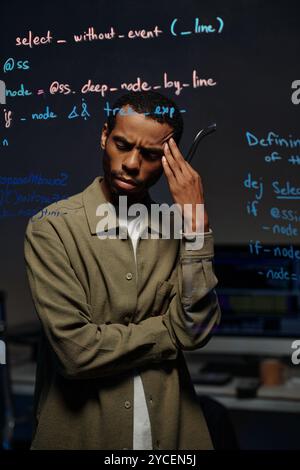 Concentrating on Developing Code in Modern Office Stock Photo