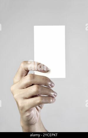 Hand holding empty card mockup Stock Photo