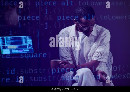 Working on Computer Code in Modern Office Environment Stock Photo
