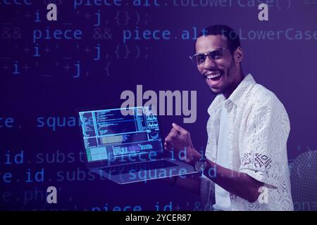 Smiling Programmer Analyzing Code on Computer Screen Stock Photo