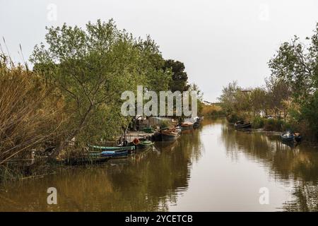 El Palmar, Spain, March 24, 2024: Traditional wooden boats in the village of El Palmar in Natural Park Albufera, Europe Stock Photo