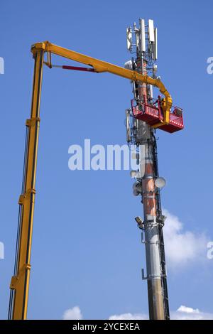 Ordinary maintenance and control to an antenna for communication Stock Photo