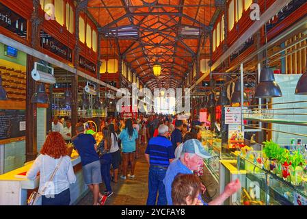 Madrid, Spain- June 06, 2017 : Indoor view with peoples of Market of San Miguel  (Spanish: Mercado de San Miguel) is a covered market located in Madri Stock Photo