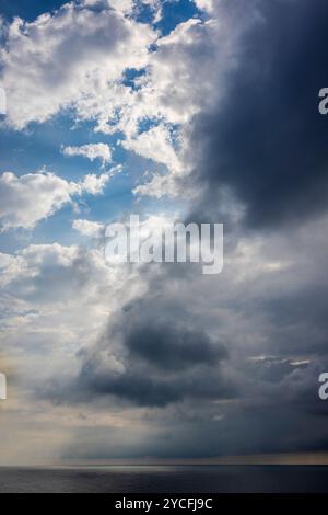 Storm clouds over the sea Stock Photo