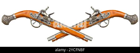 Two crossed ancient pistols isolated on a white background Stock Photo