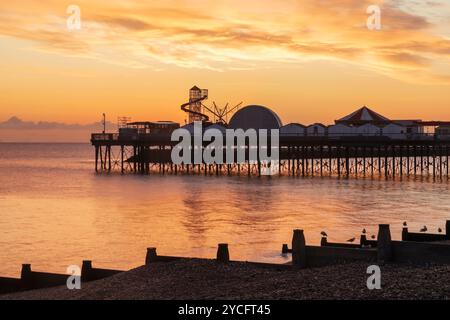 England, Kent, Herne Bay, Dawn over Sea and Pier in Background Stock Photo