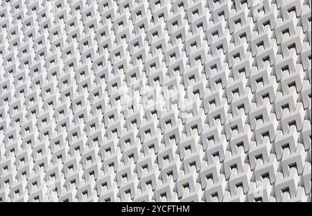 White color 3D pattern of modern building facade in the sunlight Stock Photo