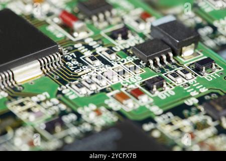 Surface of electronic circuit board - soldered components Stock Photo