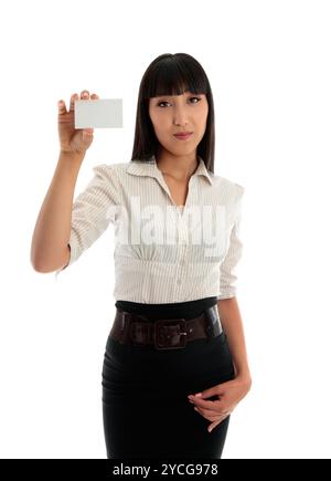 Beautiful business woman holding a credit club or business card Stock Photo