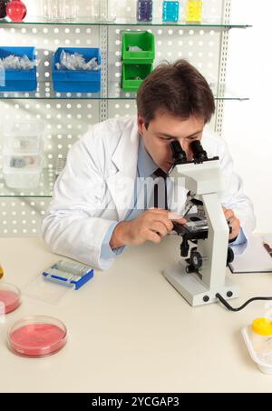 Male Scientist Using Microscopy in Laboratory Stock Photo - Alamy