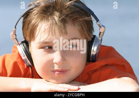 Chill out to music on a sunny summer day Stock Photo