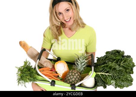 Female with eco shopping bag filled with groceries Stock Photo