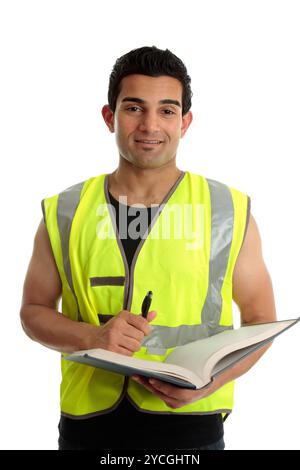 Construction worker with pen and book Stock Photo