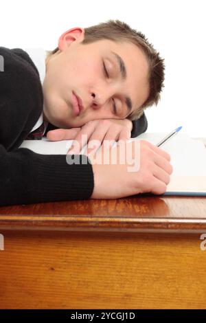 Tired bored student at desk Stock Photo