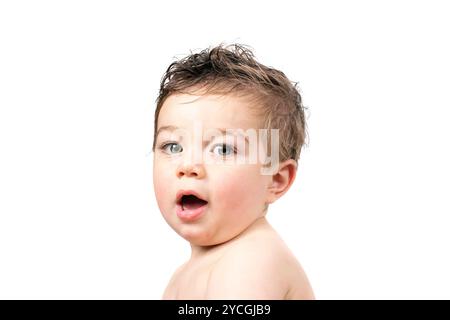 Cheeky baby Uh Oh Stock Photo