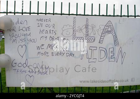 Datchet, Berkshire, UK. 23rd October, 2024. Floral tributes and messages have been laid outside Liquid Leisure in Datchet, Berkshire following the tragic death of teenager Aidan Tottman. A report of a road traffic collision outside the Liquid Leisure Centre on the Horton Road was made to Thames Valley Police at 4.07pm on Saturday 19th October 2024.   Sadly, one of the boys died in hospital on Sunday 20th October 2024.Credit: n.c/Alamy Live News Stock Photo