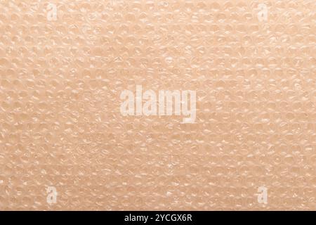 Polyethylene bubble wrap used to pack and ship fragile items, White bubble wrap packing texture. Air cushion film background Stock Photo