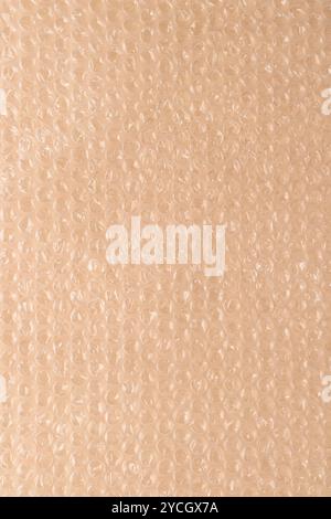 Polyethylene bubble wrap used to pack and ship fragile items, White bubble wrap packing texture. Air cushion film background Stock Photo