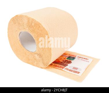 Roll of toilet paper and money isolated on white background Stock Photo