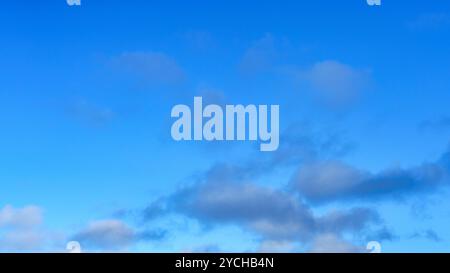 Beautiful blue sky with a few clouds. Stock Photo