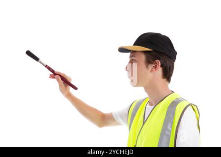 Painter decorator with paint brush Stock Photo