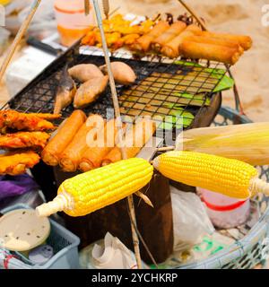 Traditional Thai food at small market on beach Stock Photo