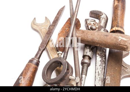 Old metal work hand tools with rust on white Stock Photo