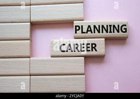 Planning Career symbol. Wooden blocks with words Planning Career. Beautiful pink background. Business and Planning Career concept. Copy space. Stock Photo