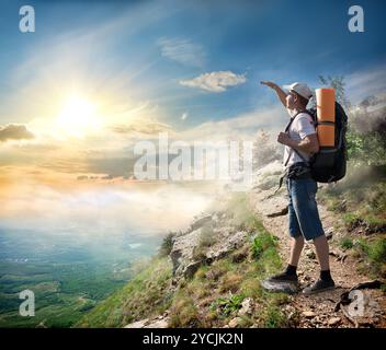 Tourist looking at the sun Stock Photo