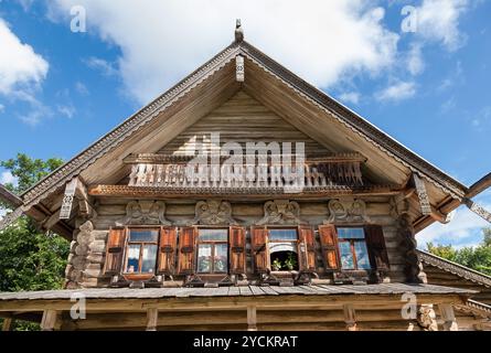 Facade of Traditional Russian Old Wooden house Stock Photo